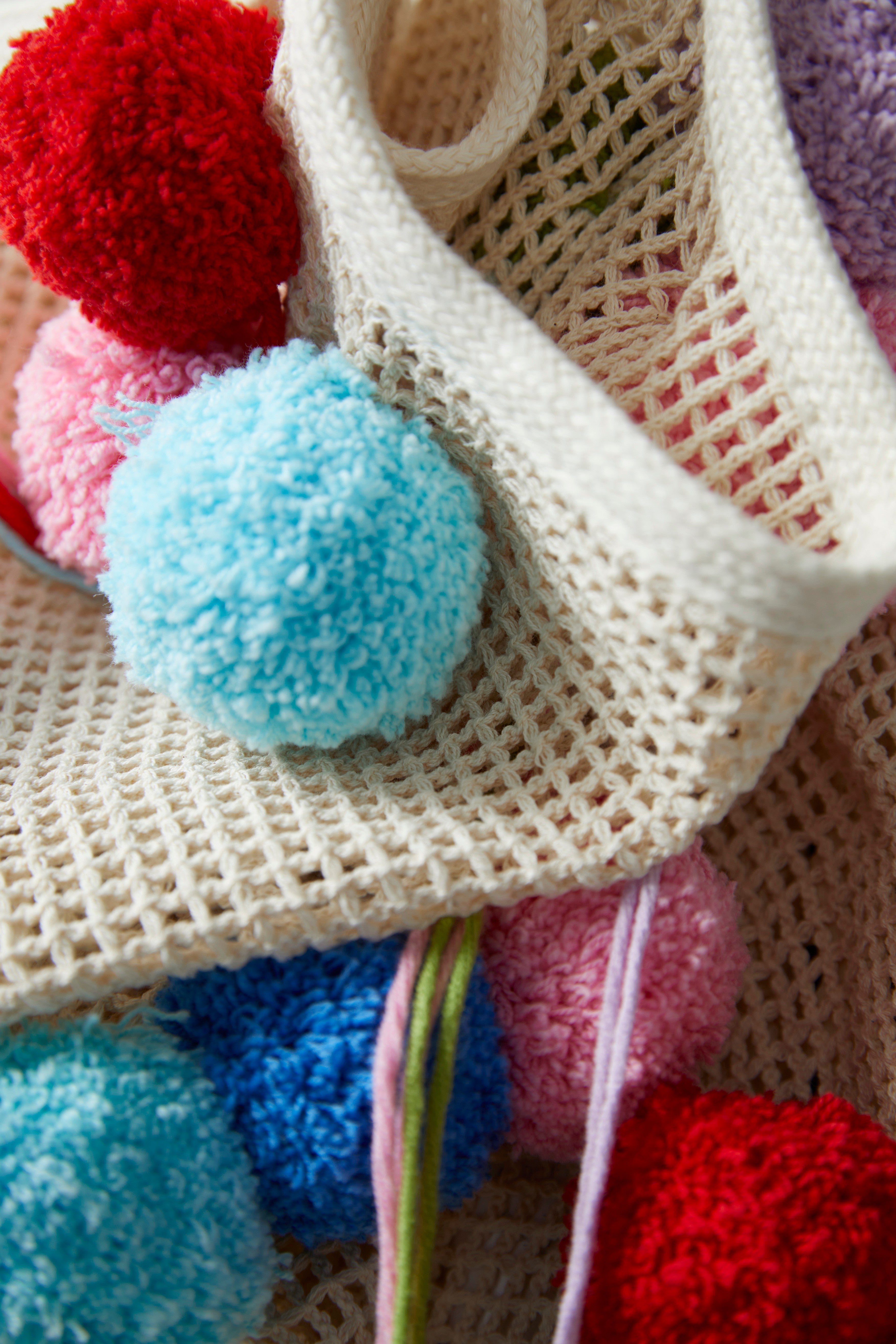 Fishnet Pompom Bag